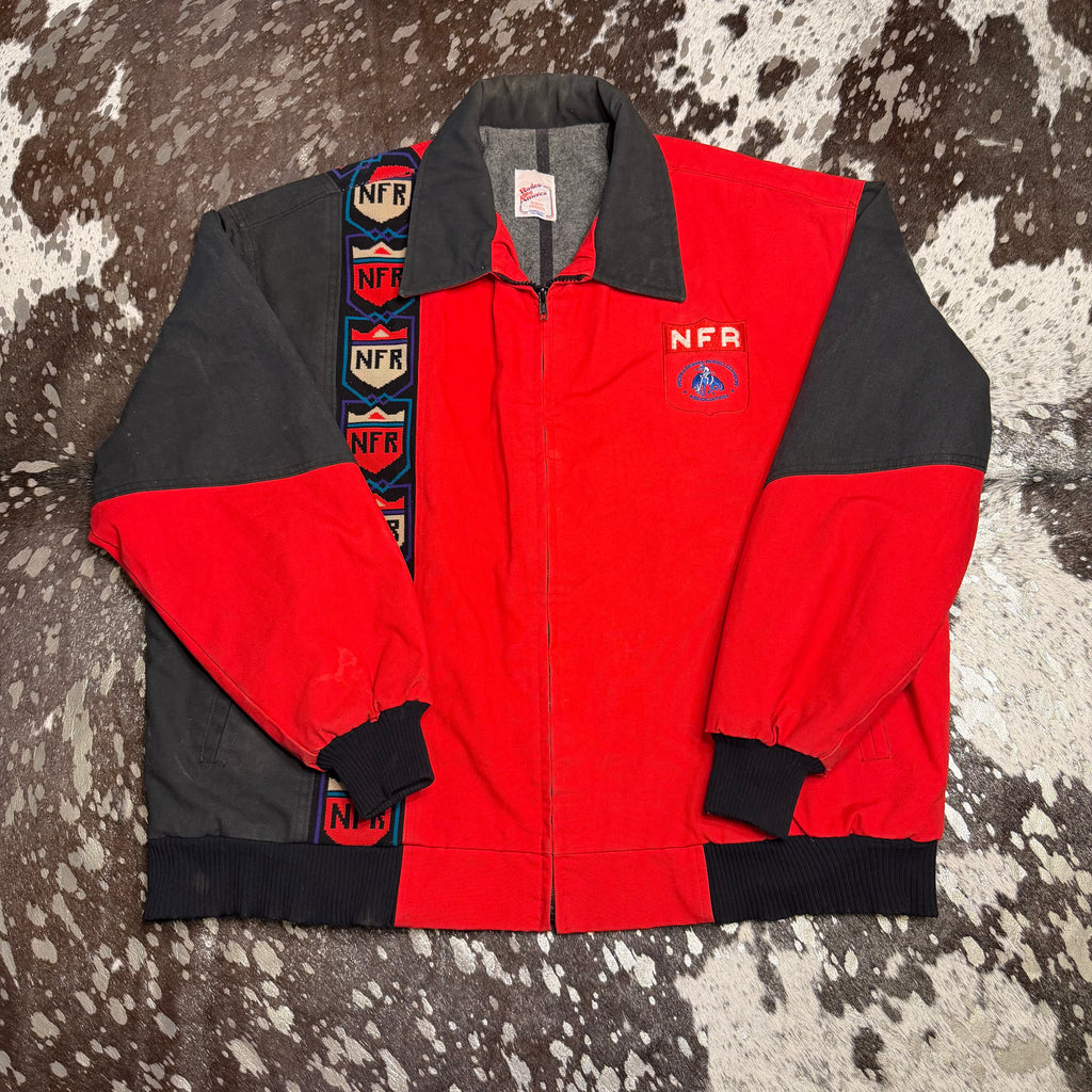 Red and black jacket with 'NFR' branding 
